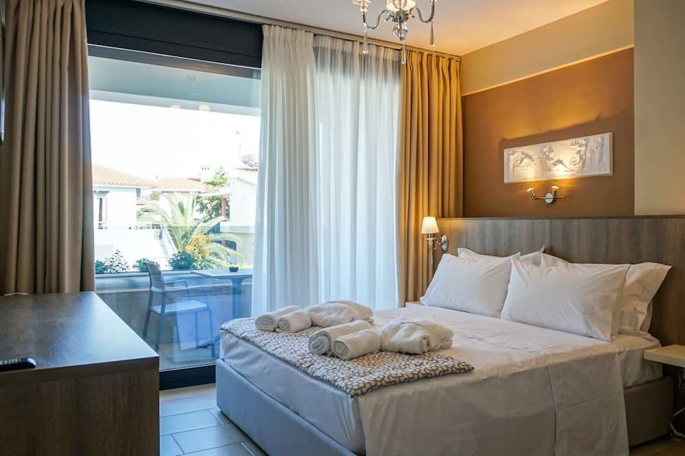 Agnes Deluxe Hotel - פפקוחורי - חדר שינה