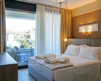 Agnes Deluxe Hotel - פפקוחורי - חדר שינה