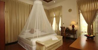 Myat Taw Win Hotel - Nay Pyi Taw - Bedroom