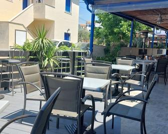 Omega Rooms Anaxos - Anaxos - Restaurant