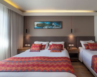 Hotel Laghetto Stilo Centro - גרמאדו - חדר שינה