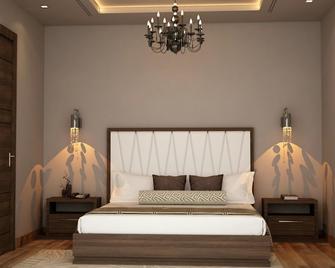 Hotel palm luxury inn - Mainpuri - Bedroom