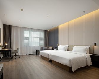Rezen Hengbang Mingyu Hotel (Wenxing Building) - Baoshan - Slaapkamer
