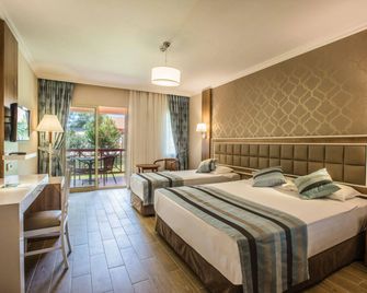 كوستور كلوب هوليداي فيلدج - شامل كلياً - كوساداسي - غرفة نوم