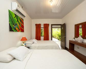 Hotel Tortuguero Beachfront - ทอร์ทูกัวโร - ห้องนอน