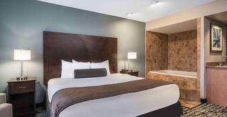 Days Inn & Suites by Wyndham Wausau - Wausau - Bedroom