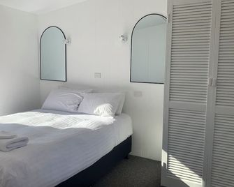 Champ Villa - Bicheno - Schlafzimmer
