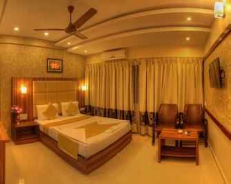 Hotel Aditya - Mysuru - Schlafzimmer