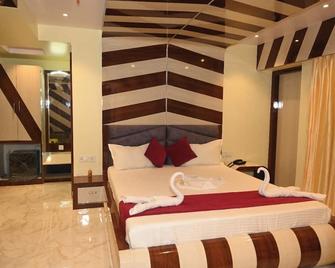 Hotel Mannat International - Digha - Slaapkamer