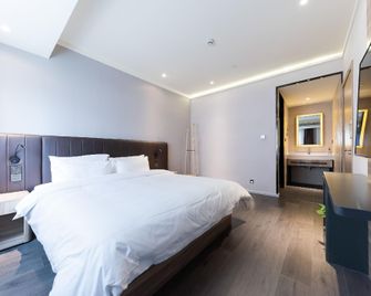Hanting Premium Hotel Hefei Qingxi Road Anhui Agricultural University - Hefei - Bedroom