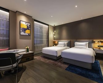 نوفوتل تيانجين دروم تاور - تيانجين - غرفة نوم