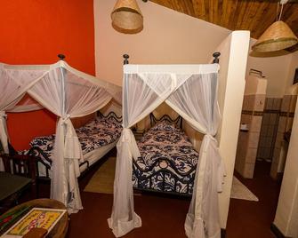 Kiboko Lodge - Usa River - Bedroom