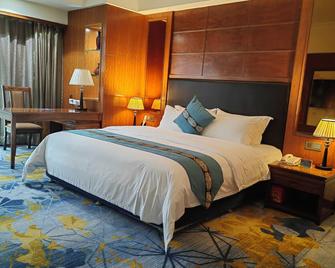 Gladden Hotel Jiangmen - Jiangmen - Bedroom