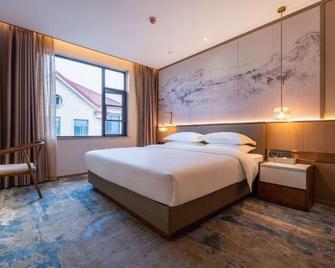 Qixing Lake Leisure Hotel - Suizhou - Slaapkamer
