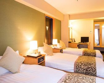 هوتل أرياون كوشيرو - كوشيرو - غرفة نوم