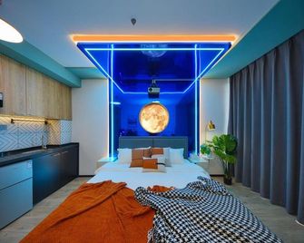 Fengyue Intelligent E-sports Apartment (City Media Plaza) - Qingdao - Schlafzimmer