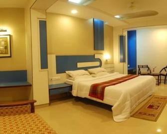 Nayak Beach Resort - פורי - חדר שינה