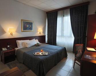 Hotel Leonardo - Brescia - Κρεβατοκάμαρα