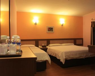 The Inn Hotel - קואלה טרנגאנו - חדר שינה