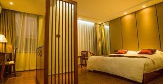 Crown Hotel - Xishuangbanna - Bedroom