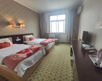 Shangri-la Ziyouxing Hotel - Dêqên - Habitación