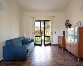 Residence il Melograno - San Teodoro - Obývací pokoj