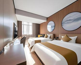 Guangzhou Shuishanfang Hotel - Guangzhou - Bedroom