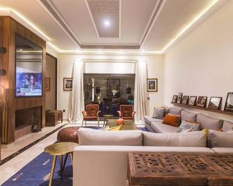 My Rental Homes | Villa Annarosa with pool, garden and gym - Azib Oulad Lâdem - Living room