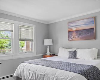 Private Balcony Above Lake Charlevoix | Cozy Up & Unwind | Fireplace | - Boyne City - Bedroom