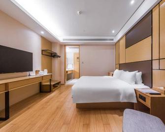 Ji Hotel Haikou Red City Lake - Haikou - Bedroom