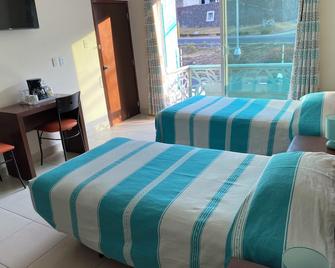 Cordiality Inn - Puebla - Schlafzimmer
