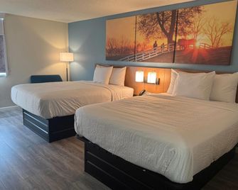 Days Inn & Suites by Wyndham Festus - Festus - Bedroom