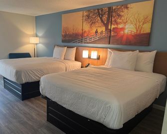 Days Inn & Suites by Wyndham Festus - Festus - Спальня