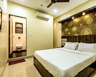 Hotel Shambuji - Thane - Schlafzimmer