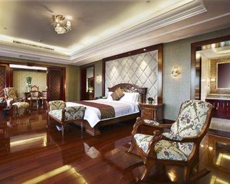 Zhangjiajie Da Cheng Shanshui Hotel - ג'אנגג'יאיי - חדר שינה