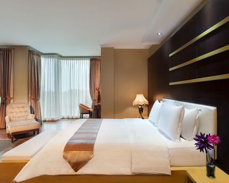 ساهاتي هوتل - جاكرتا - غرفة نوم