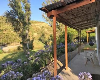 Riversong Cottages - אדו