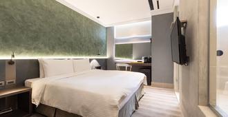 Green Hotel - Magong - Schlafzimmer