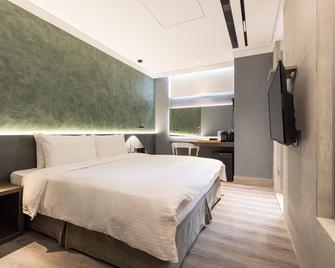 Green Hotel - Magong City - Bedroom