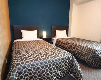 Hotel The Garden VI Ichinomiya - Ichinomiya - Спальня