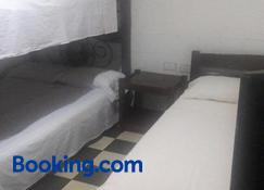 Hospedaje Santa Bárbara - Buga (Valle del Cauca) - Slaapkamer