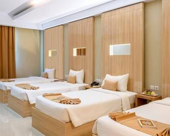 Sahid Azizah Syariah Hotel and Convention Kendari - Kendari - Bedroom