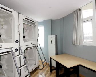 Meet Fish International Youth Hostel - צ'ינגדאו - חדר שינה