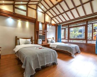 Huayu Mengjing Courtyard Hotel - Lijiang - Chambre