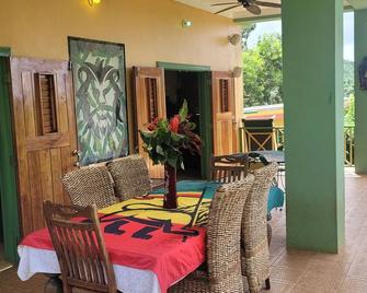 Lion Farm's Eco Villas in 9 Mile Jamaica with Mountain View’s - Bamboo - Patio