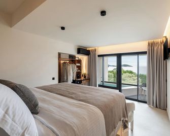 Nimfi Suites - Skiáthos - Makuuhuone