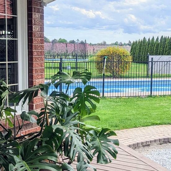 Pool view of A poolside guest suite nested in a beautiful orchard along winery route