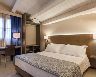 La Grotta Hotel - סן מרינו - חדר שינה