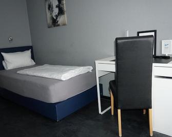 Hotel Come In - Menden - Schlafzimmer