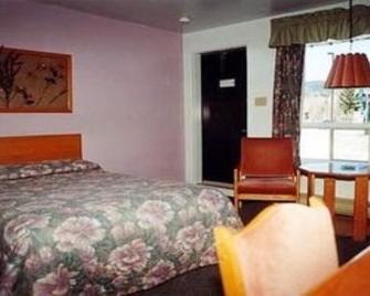 Motel Chantmartin - Tadoussac - Camera da letto